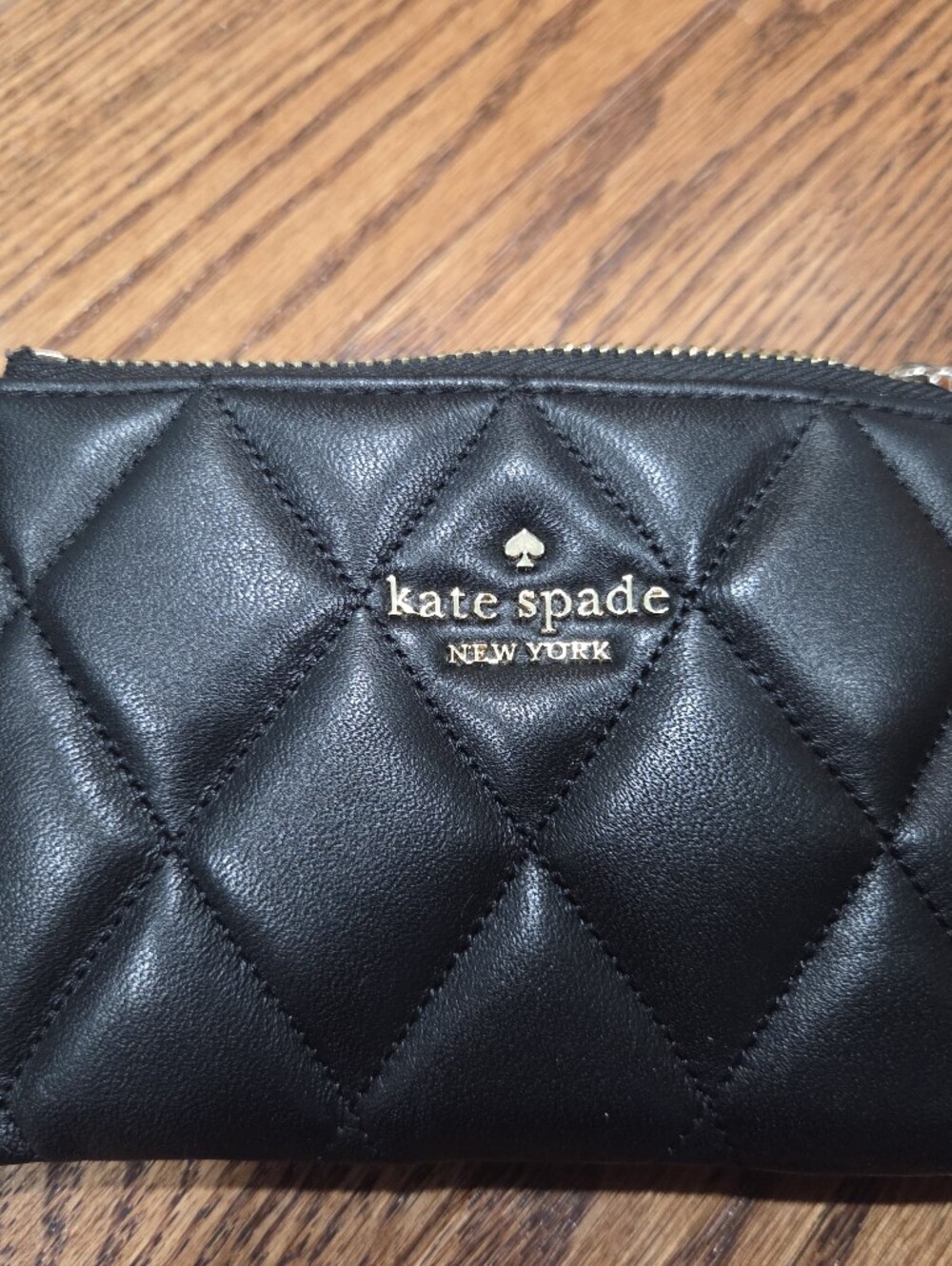 kate spade Black Quilted Leather Zip Pouch with Gold Logo